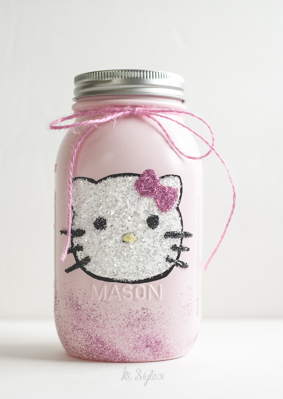 DIY Glitter Hello Kitty mason jar decor.