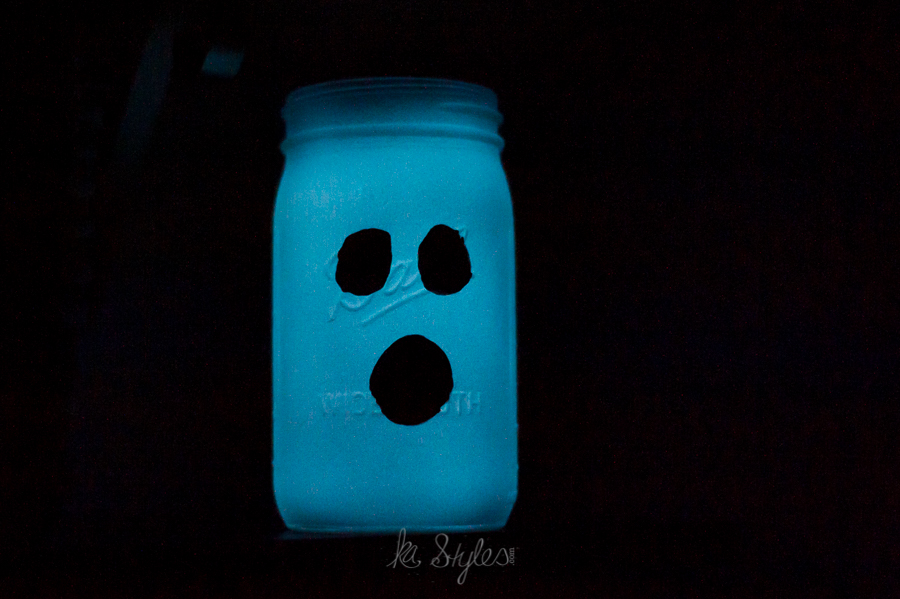 Glow in the dark spray paint ghost mason jar.