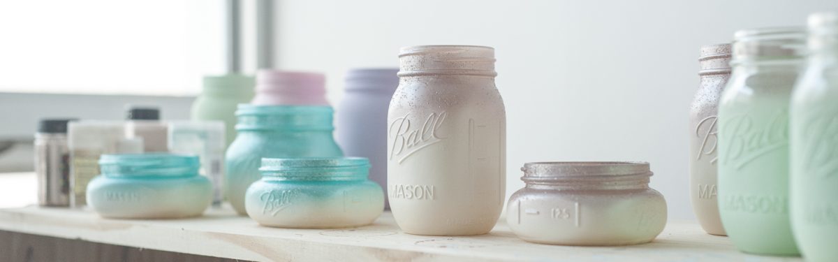 Buy painted and glittered mason jars.